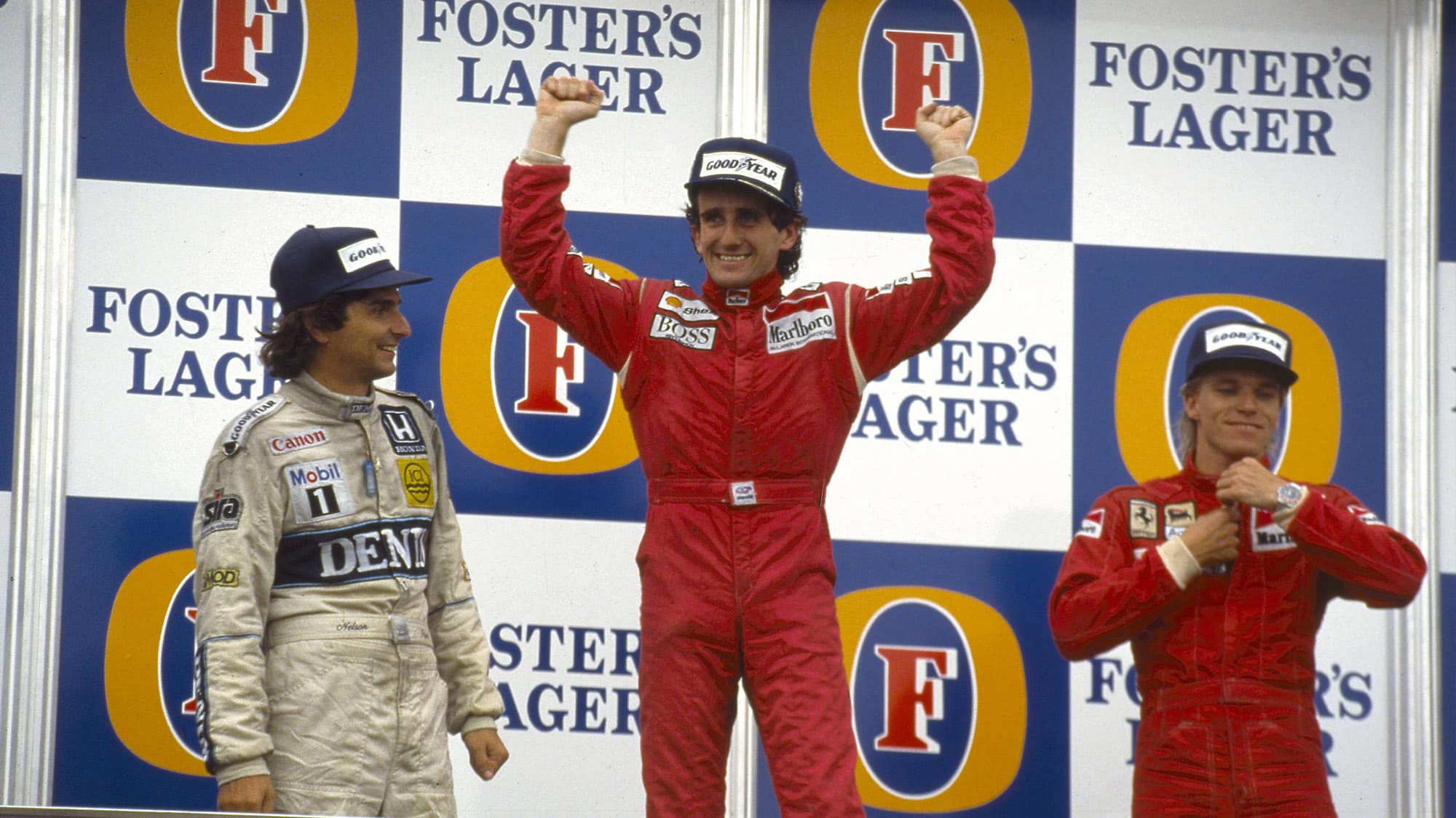 Alain Prost stands on the top of the podium at Adelaide after winning the 1986 Australian Grand Prix and that year's Formula 1 Drivers' championship