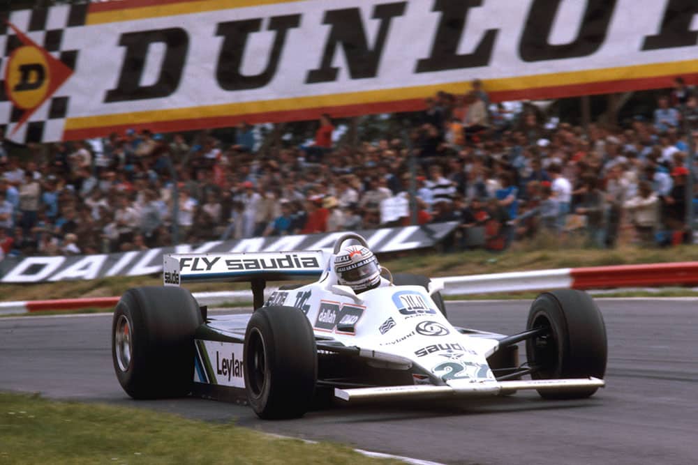 Alan Jones (Williams FW07B Ford) 1st position at Druids.