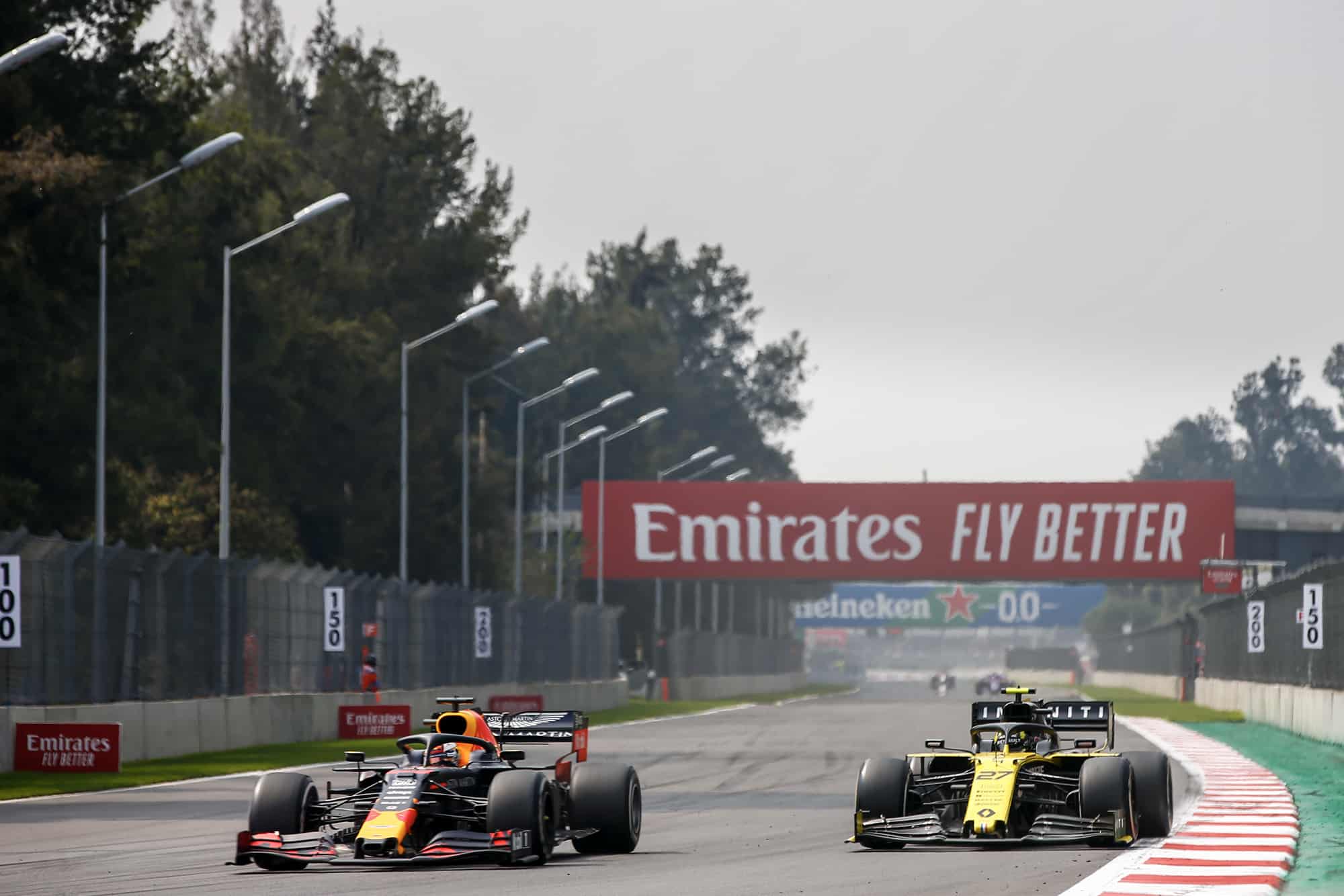 Max Verstappen overtakes Nico Hulkenberg during the 2019 F1 Mexican Grand Prix