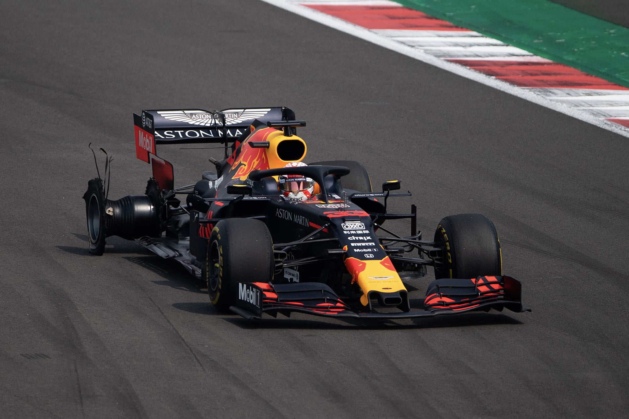 Max Verstappen's Red bull with destroyed right rear tyre after a puncture at the 2019 F1 Mexican Grand Prix