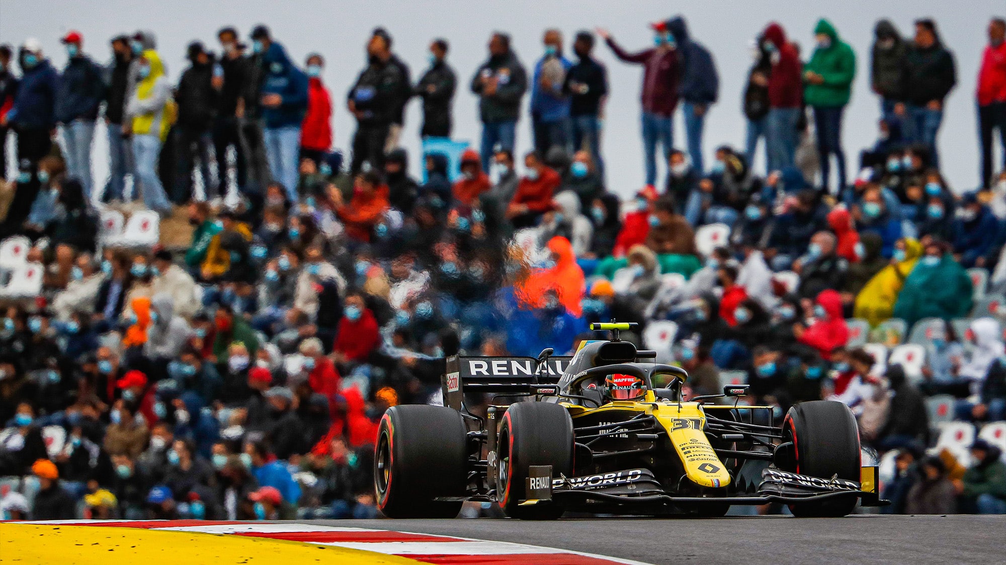 Esteban Ocon in front of crowds at the 2020 F1 Portuguese Grand Prix at Portimao