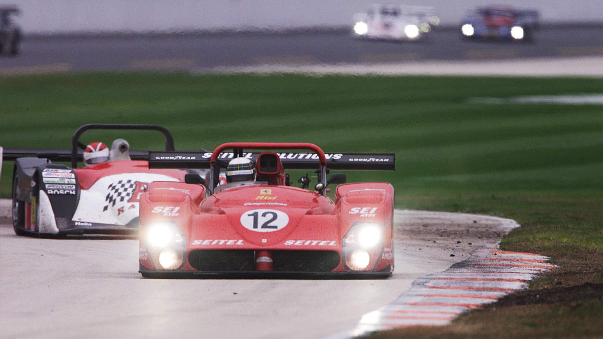 Allan McNish and David Brabham on track