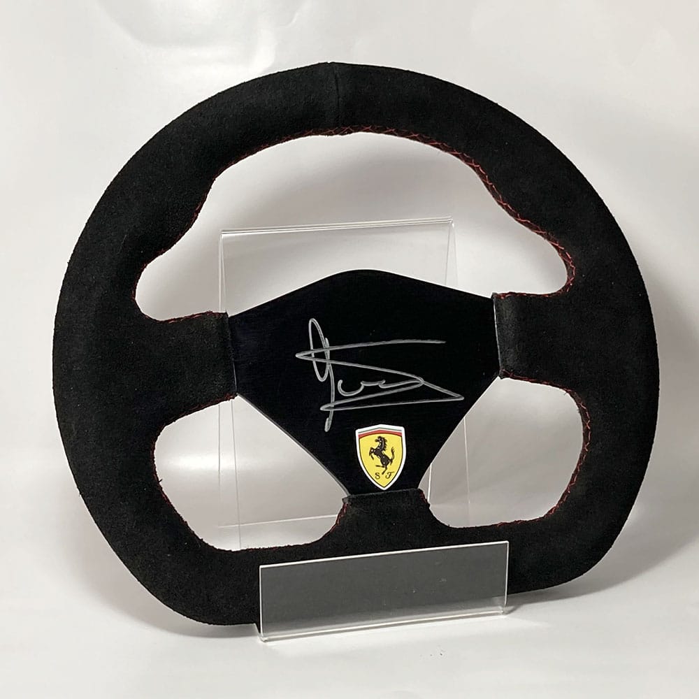 Jody Scheckter signed Ferrari racing steering wheel