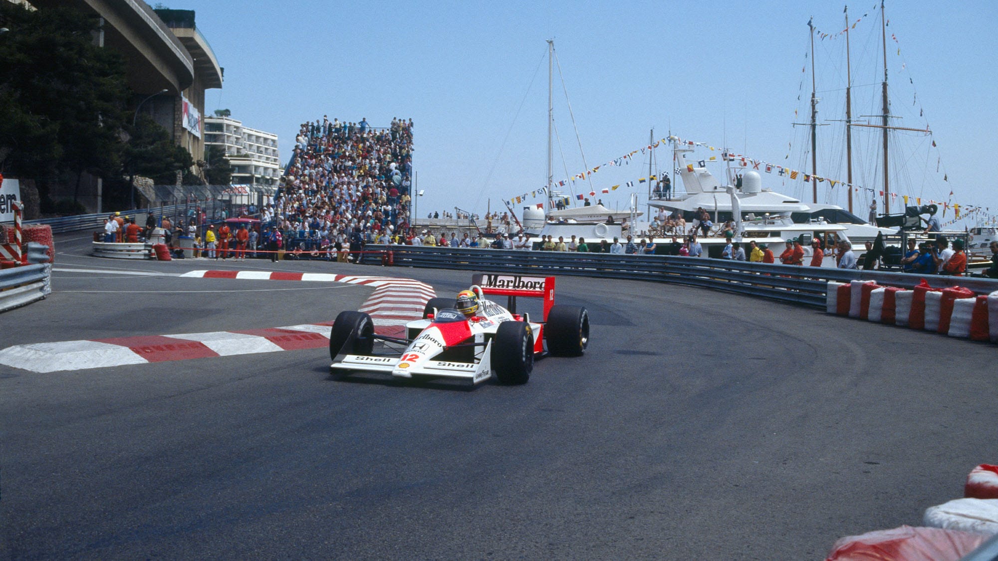 Formula One racecar driver Ayrton Senna of the McLaren-Honda racing team rounds a turn during the Monaco Grand Prix. (Photo by Dimitri Iundt/Corbis/VCG via Getty Images)