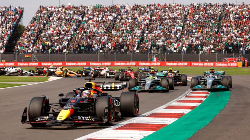 Max Verstappen leads after the start of the 2022 Mexican GP as Geirge Russell runs off the track