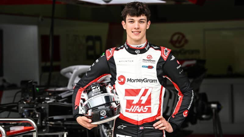 Oliver Bearman in front of Haas F1 garage before practice session at 2024 Emilia Romagna Grand Prix