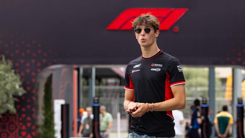 Oliver Bearman walks into the F1 paddock at the 2024 Azerbaijan Grand Prix